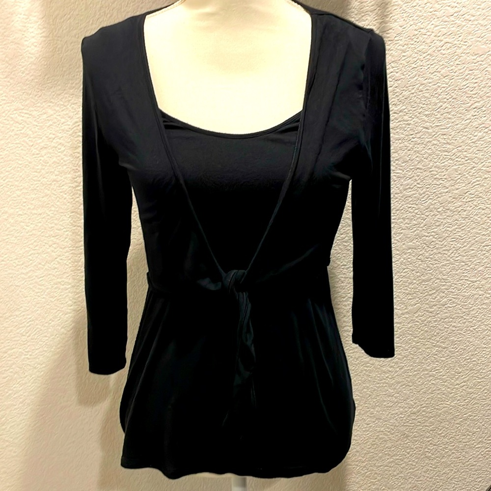 Raisey Black tank w/crop tie jacket attached.Fabric is rayon spandex. Nice fit!